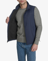 View of model wearing Navy Blazer Men's Lightweight Padded Vest.