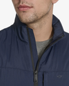 View of model wearing Navy Blazer Men's Lightweight Padded Vest.