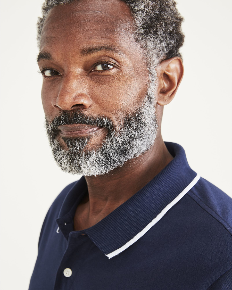 View of model wearing Navy Blazer Men's Perfect Polo.