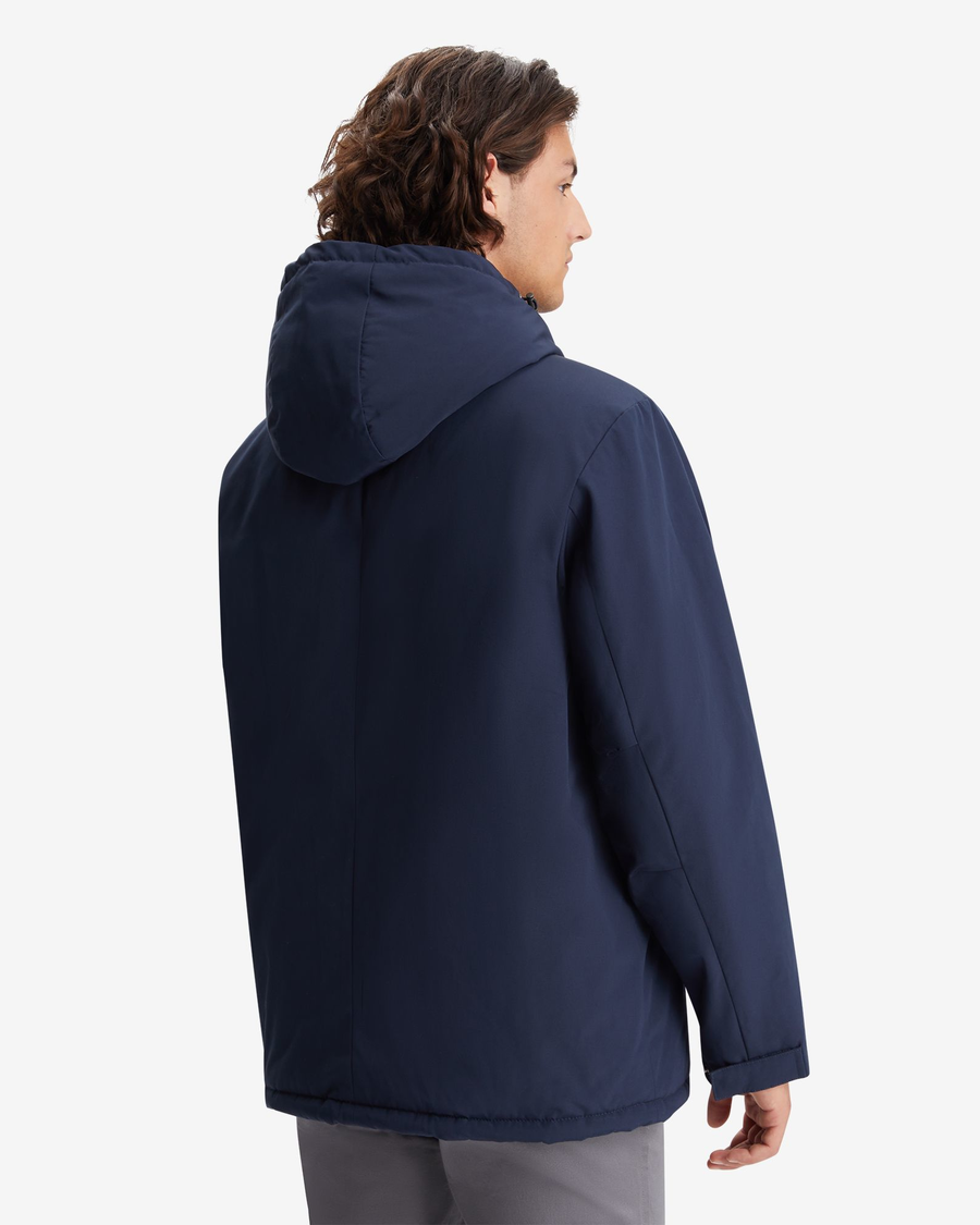 Back view of model wearing Navy Blazer Men's Poly Arctic Hooded Jacket.