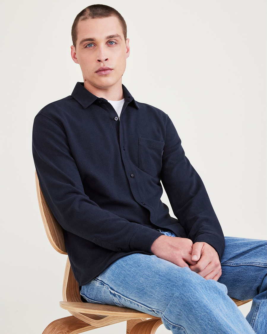 View of model wearing Navy Blazer Men's Slim Fit Knit Button-Up Shirt.