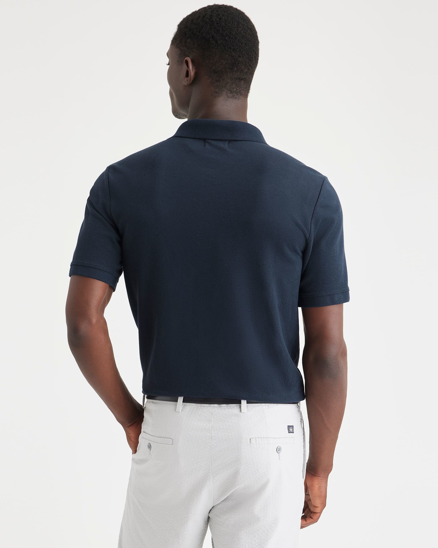 Back view of model wearing Navy Blazer Men's Slim Fit Original Polo Shirt.