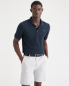 Front view of model wearing Navy Blazer Men's Slim Fit Original Polo Shirt.