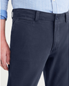 View of model wearing Navy Blazer Men's Slim Fit Smart 360 Flex California Chino Pants.