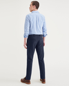 Back view of model wearing Navy Blazer Men's Slim Fit Smart 360 Flex California Chino Pants.