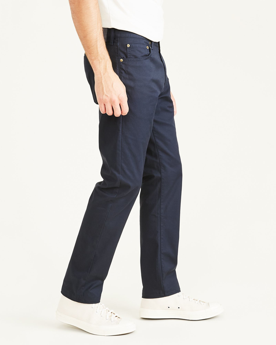 Side view of model wearing Navy Blazer Men's Slim Fit Smart 360 Flex Jean Cut Pants.