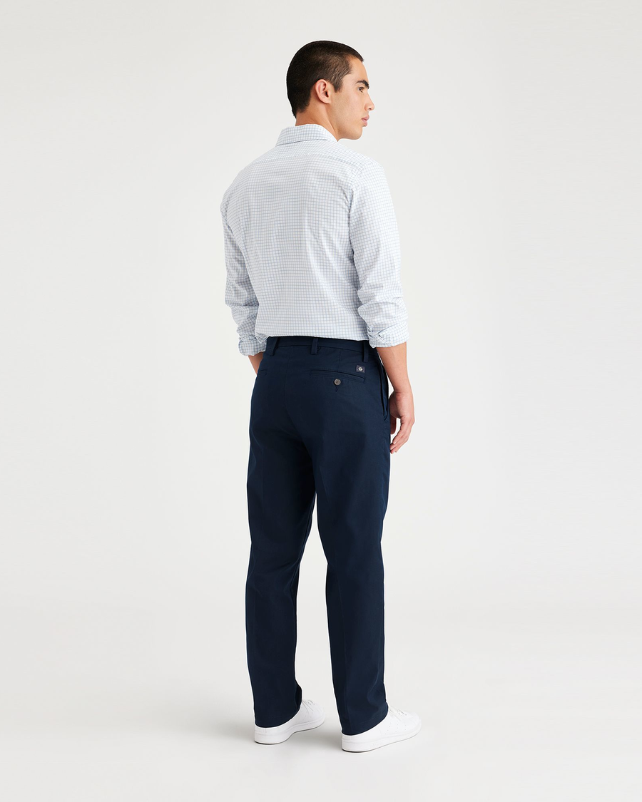 Back view of model wearing Navy Blazer Men's Slim Fit Smart 360 Flex Workday Khaki Pants.