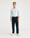 Front view of model wearing Navy Blazer Men's Slim Fit Smart 360 Flex Workday Khaki Pants.