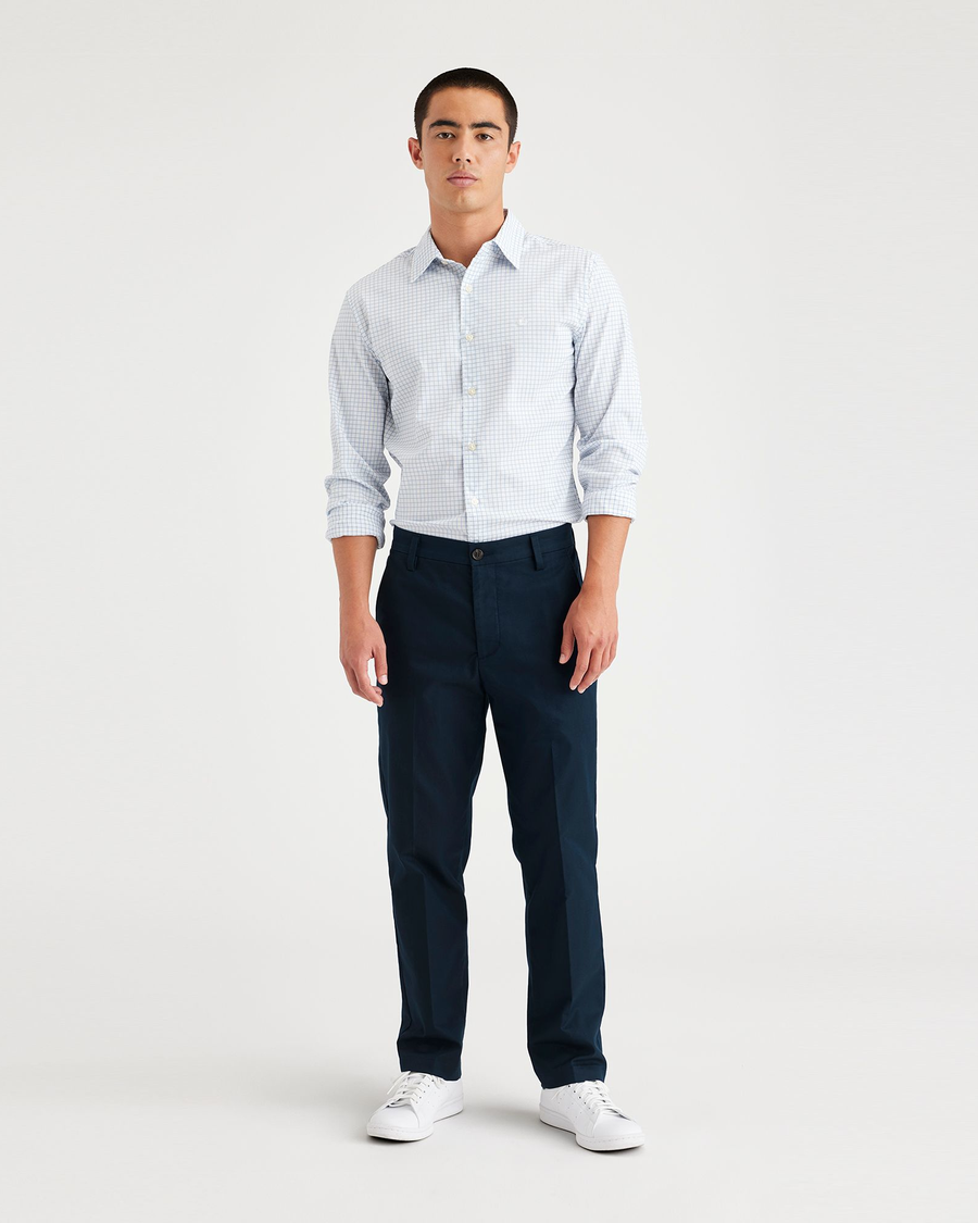 Front view of model wearing Navy Blazer Men's Slim Fit Smart 360 Flex Workday Khaki Pants.