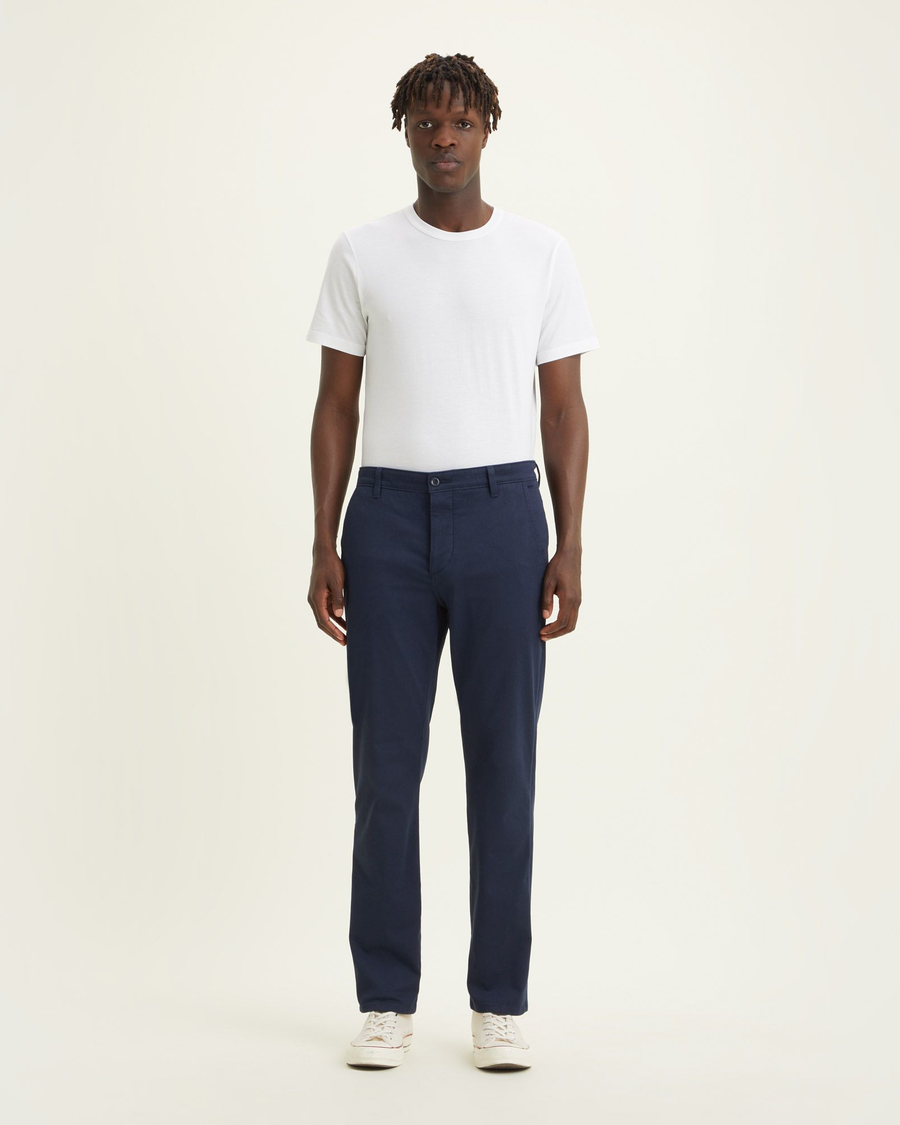 Front view of model wearing Navy Blazer Men's Slim Fit Supreme Flex Alpha Khaki Pants.