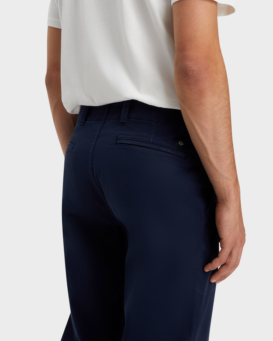 View of model wearing Navy Blazer Men's Straight Fit Smart 360 Flex California Chino Pants.