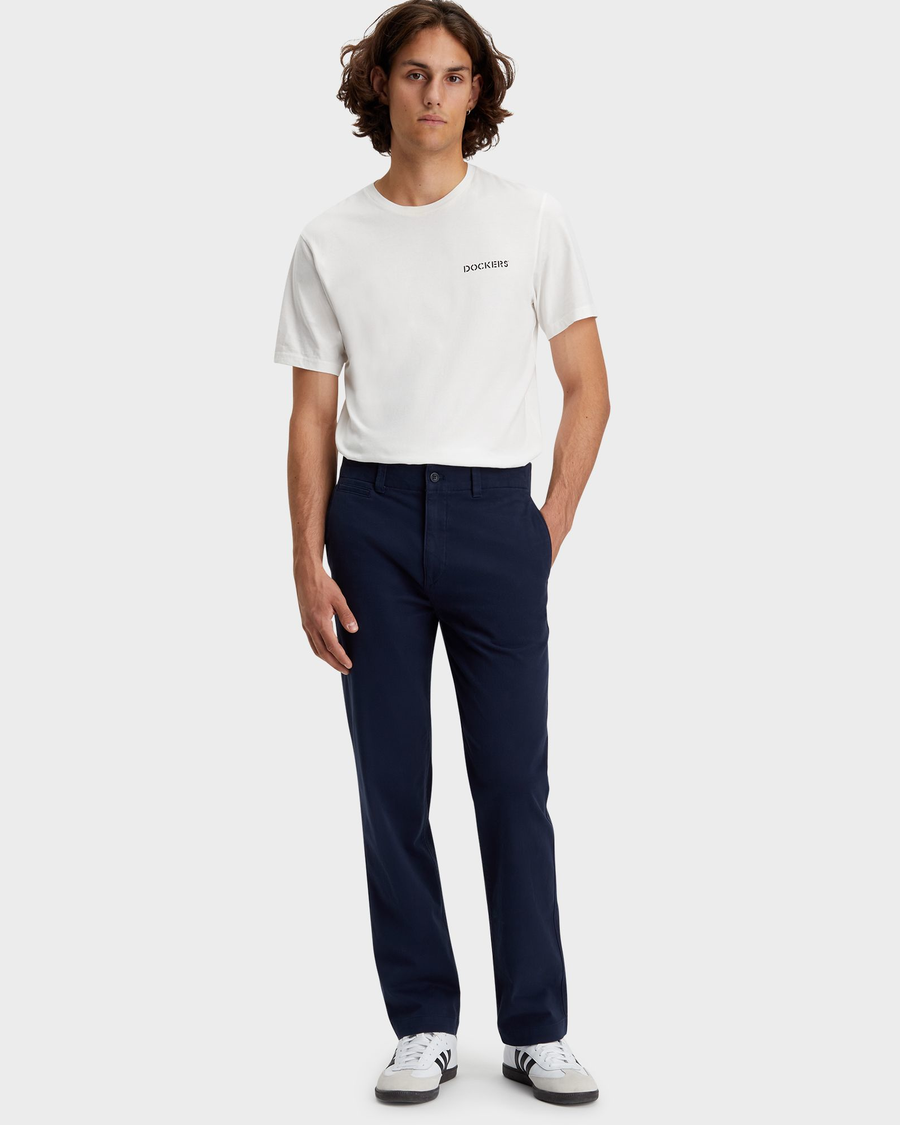 Front view of model wearing Navy Blazer Men's Straight Fit Smart 360 Flex California Chino Pants.