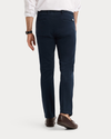Back view of model wearing Navy Blazer Original Chino Pants, Slim Fit.
