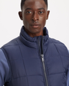 View of model wearing Navy Blazer Quilted Vest, Regular Fit.