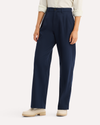 View of model wearing Navy Blazer Signature Iron Free Khakis, High Wide with Stain Defender®.