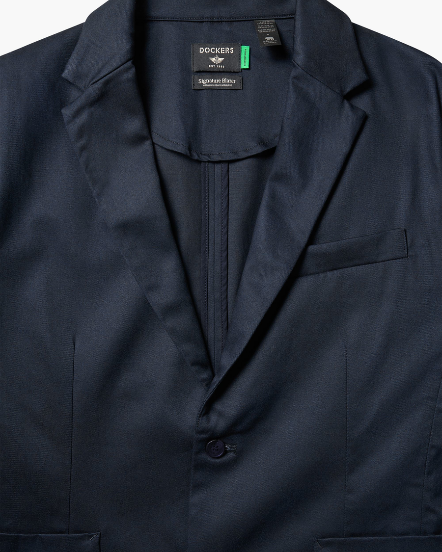 View of model wearing Navy Blazer Signature Refined Blazer, Regular Fit.