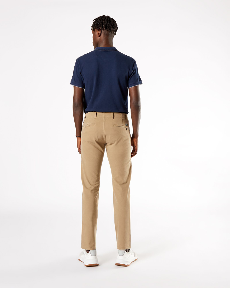 Back view of model wearing New British Khaki Men's Slim Fit Smart 360 Flex Alpha Khaki Pants.