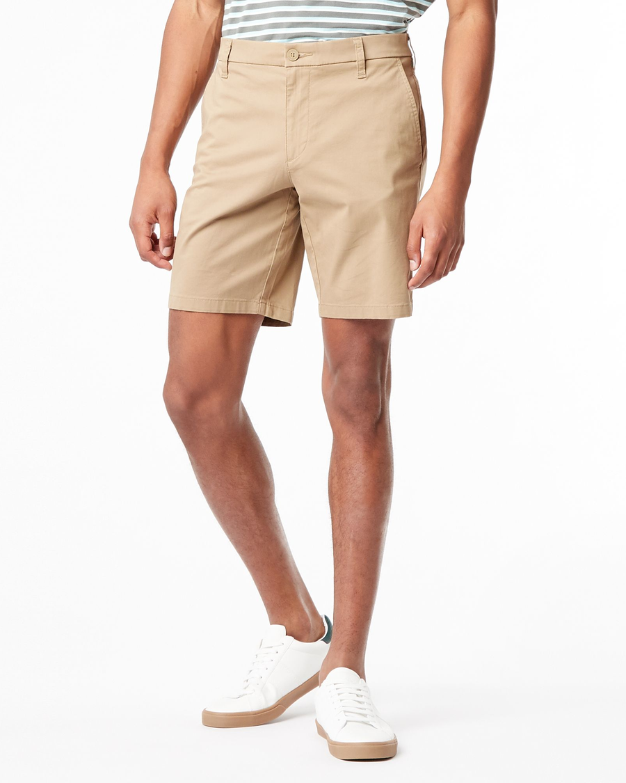 Front view of model wearing New British Khaki Men's Straight Fit Ultimate Shorts.