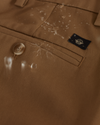 View of model wearing New British Khaki Signature Iron Free Khakis, Creased, Straight Fit with Stain Defender®.