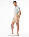 Side view of model wearing New British Khaki Ultimate Shorts.