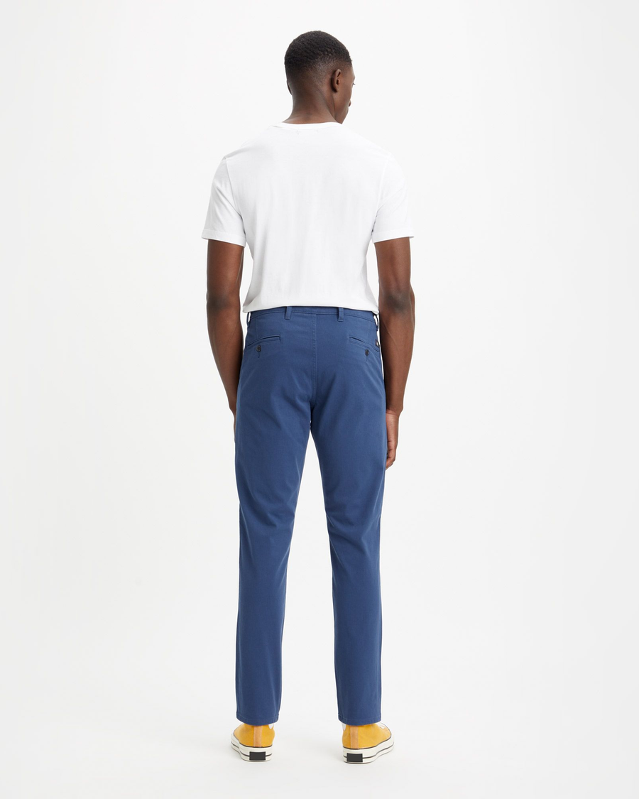 Back view of model wearing Ocean Blue Men's Skinny Fit Supreme Flex Alpha Khaki Pants.