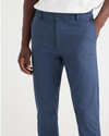 View of model wearing Ocean Blue Men's Slim Fit Original Chino Pants.