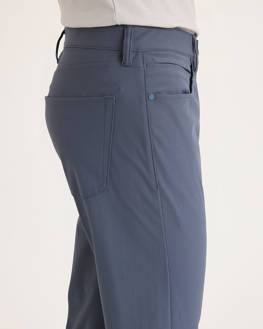 Side view of model wearing Ombre Blue Go Pant, Slim Fit with Airweave.