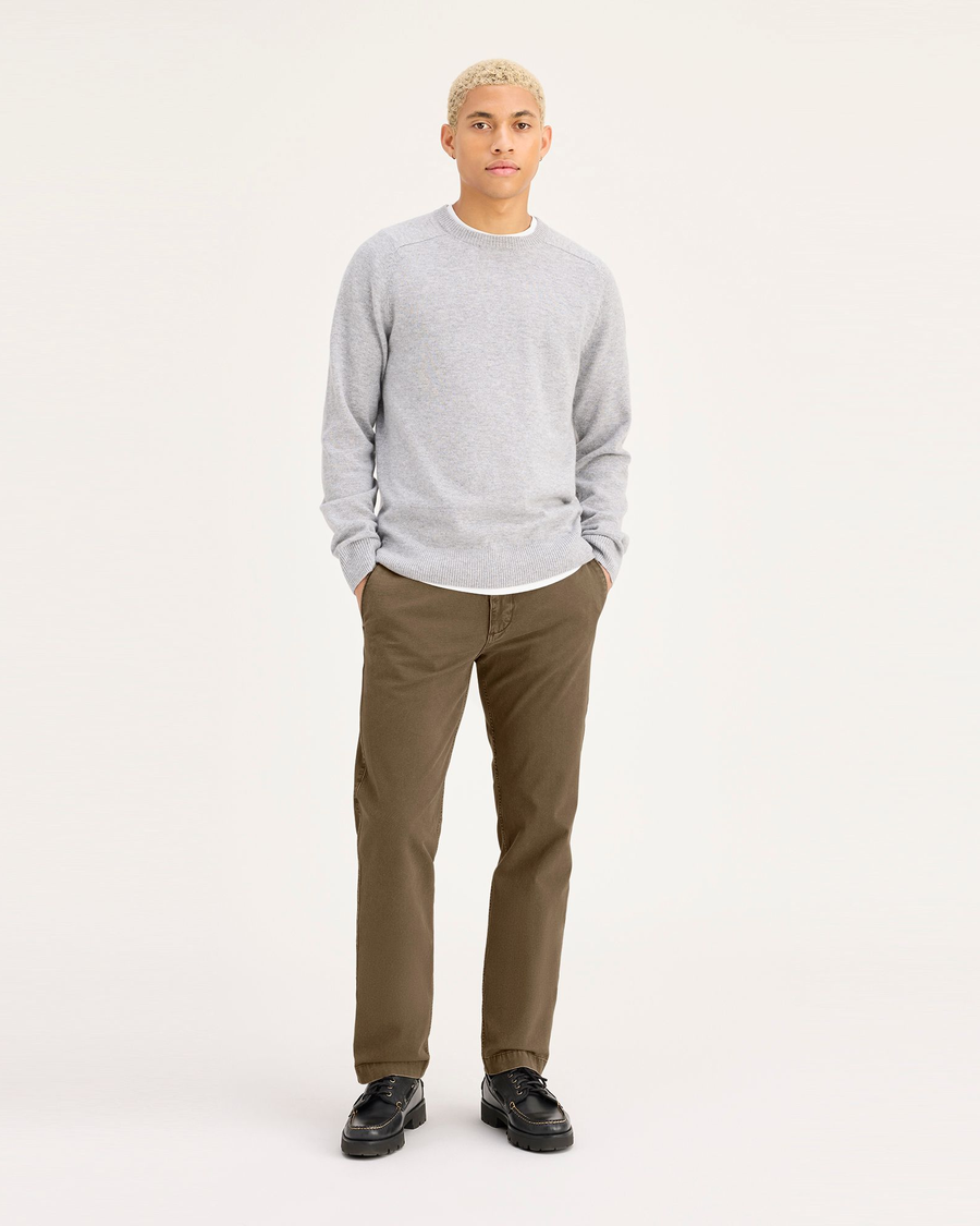 Front view of model wearing Otter Stonewash Men's Slim Fit Smart 360 Flex California Chino Pants.