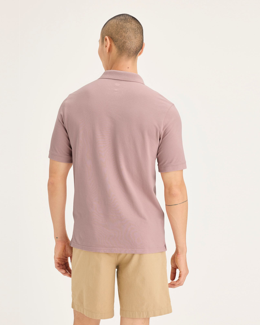 Back view of model wearing Pale Mauve Men's Slim Fit Pique Polo.