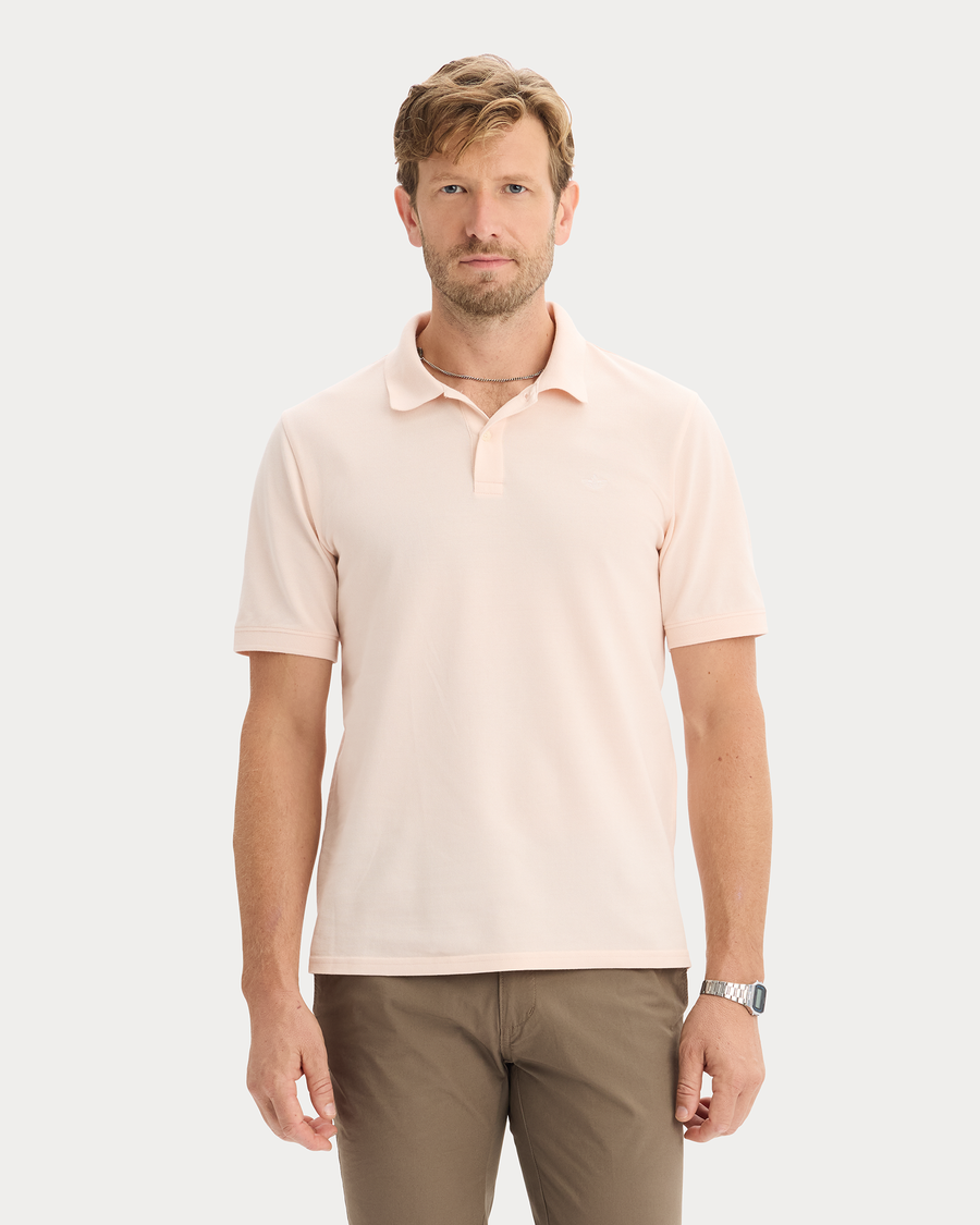 View of model wearing Peach Blush Pique Polo, Slim Fit.