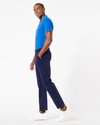 Side view of model wearing Pembroke Men's Slim Fit Smart 360 Flex Ultimate Chino Pants.