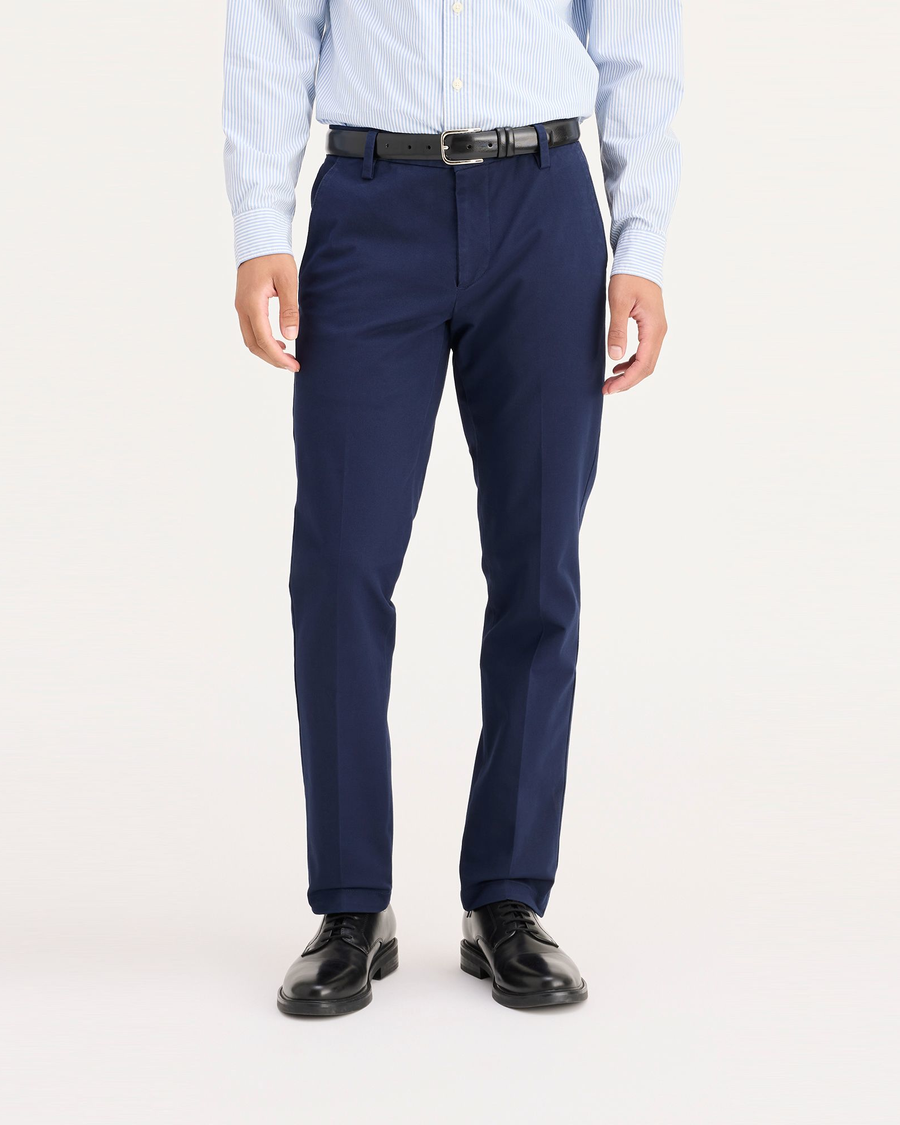 Front view of model wearing Pembroke Men's Slim Fit Smart 360 Flex Workday Khaki Pants.