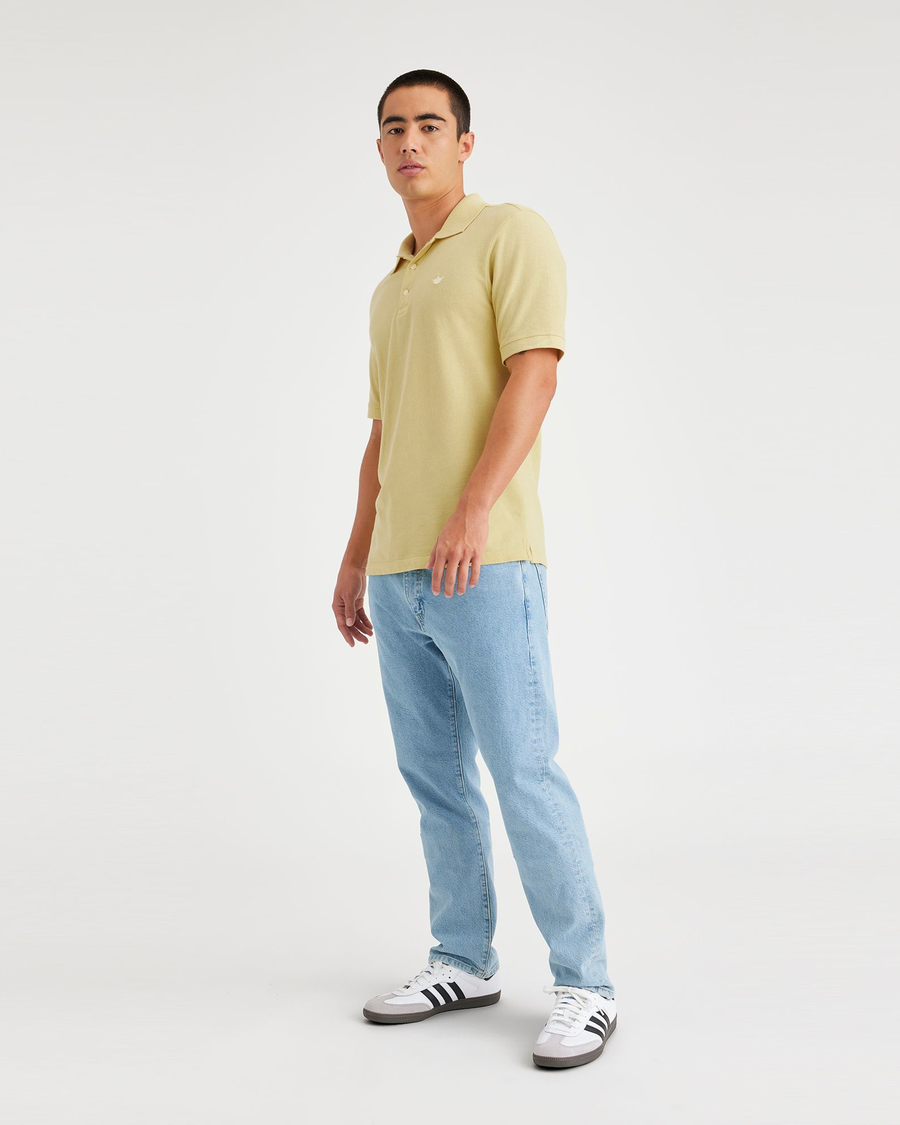 View of model wearing Pineapple Slice Men's Slim Fit Original Polo.