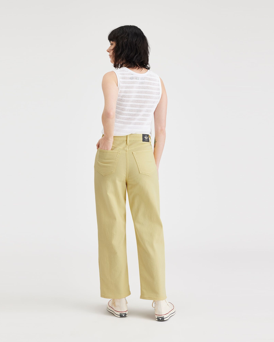 Back view of model wearing Pineapple Slice Wash Women's Straight Fit High Jean Cut Pants.