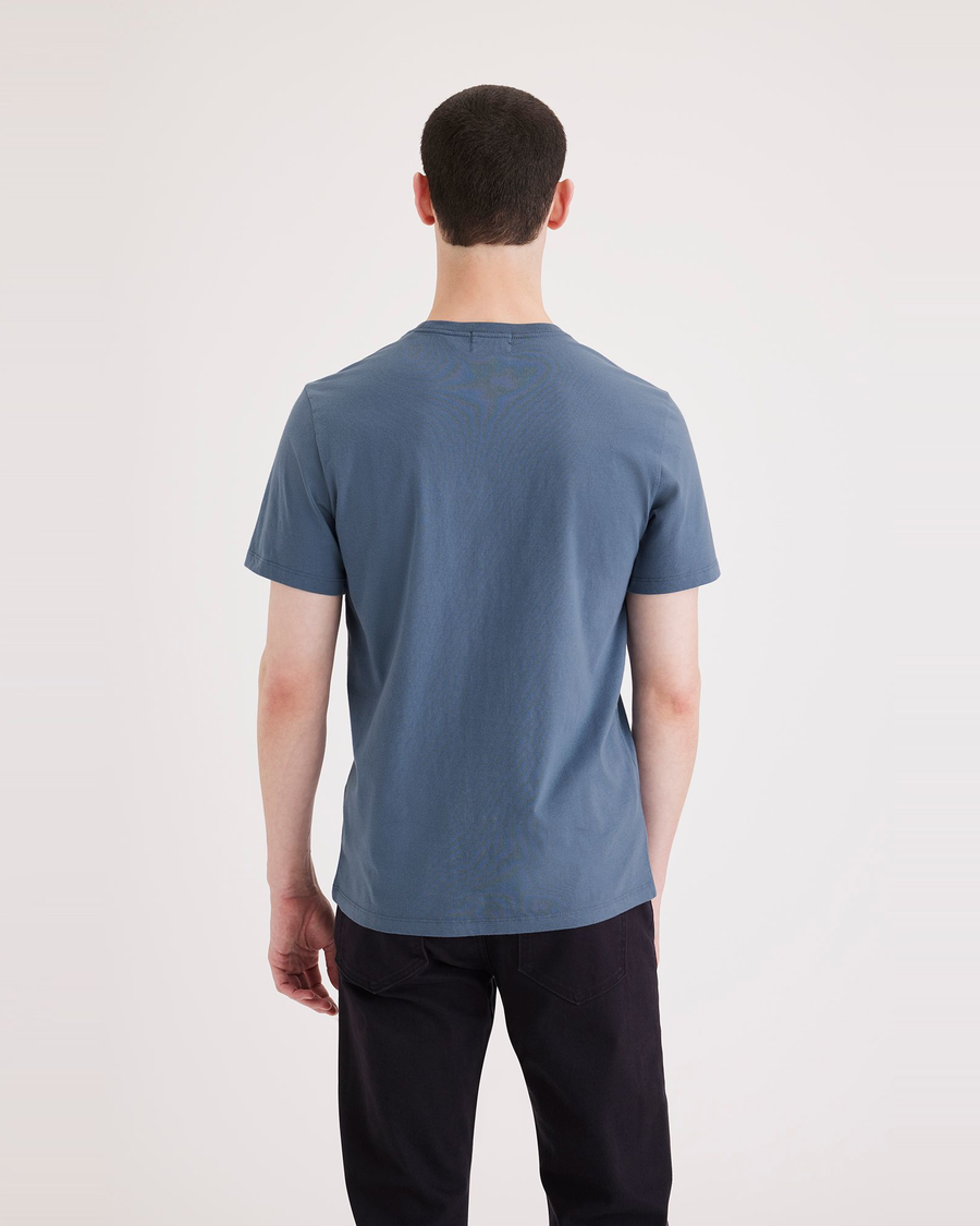 Back view of model wearing Placid Blue Men's Slim Fit Logo Tee.