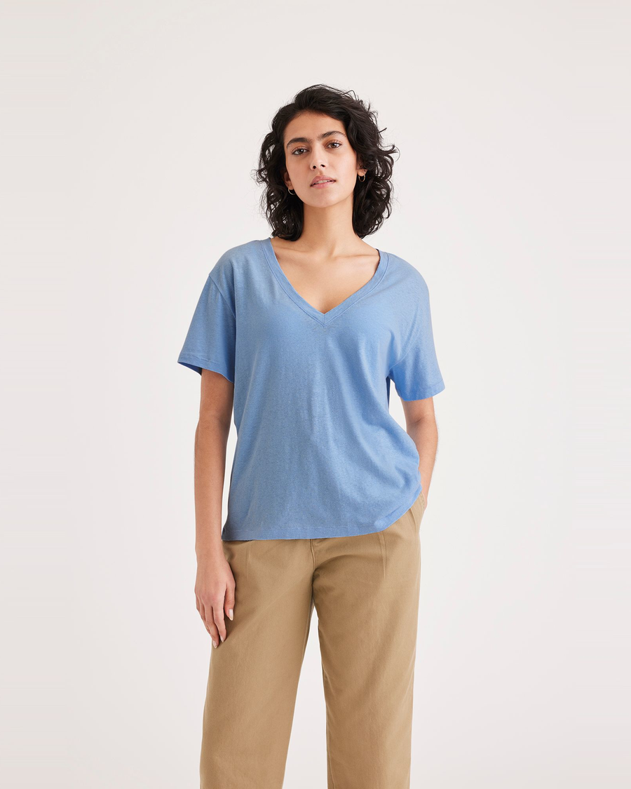 Front view of model wearing Placid Blue Women's Deep V-Neck Tee Shirt.