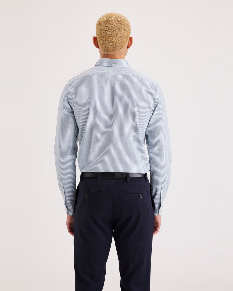 Back view of model wearing Plateau Blue Fin Men's Slim Fit 2 Button Collar Shirt.