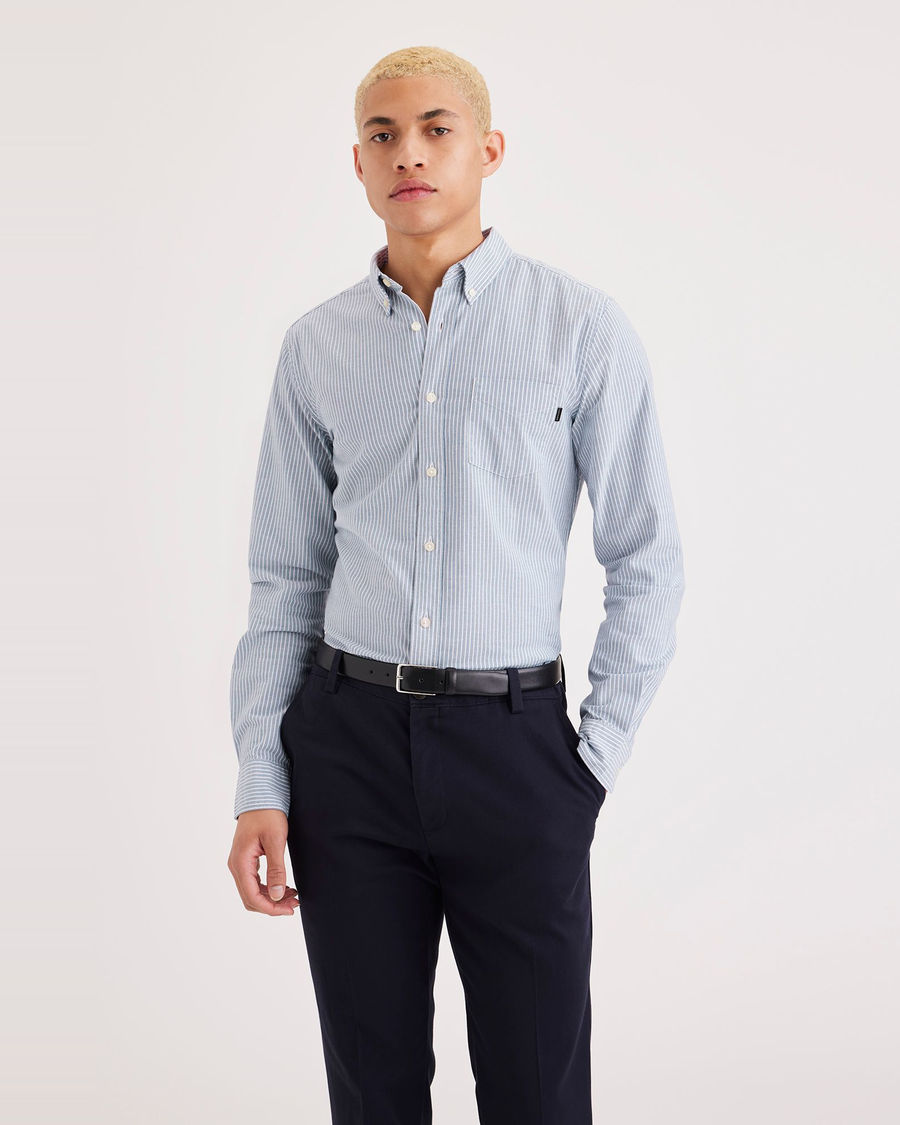 Front view of model wearing Plateau Blue Fin Men's Slim Fit 2 Button Collar Shirt.