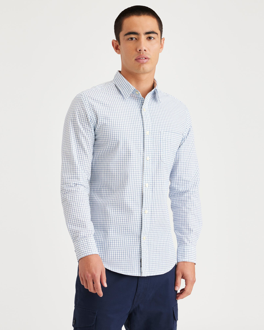 Front view of model wearing Ripple Powder Blue Men's Slim Fit Icon Button Up Shirt.