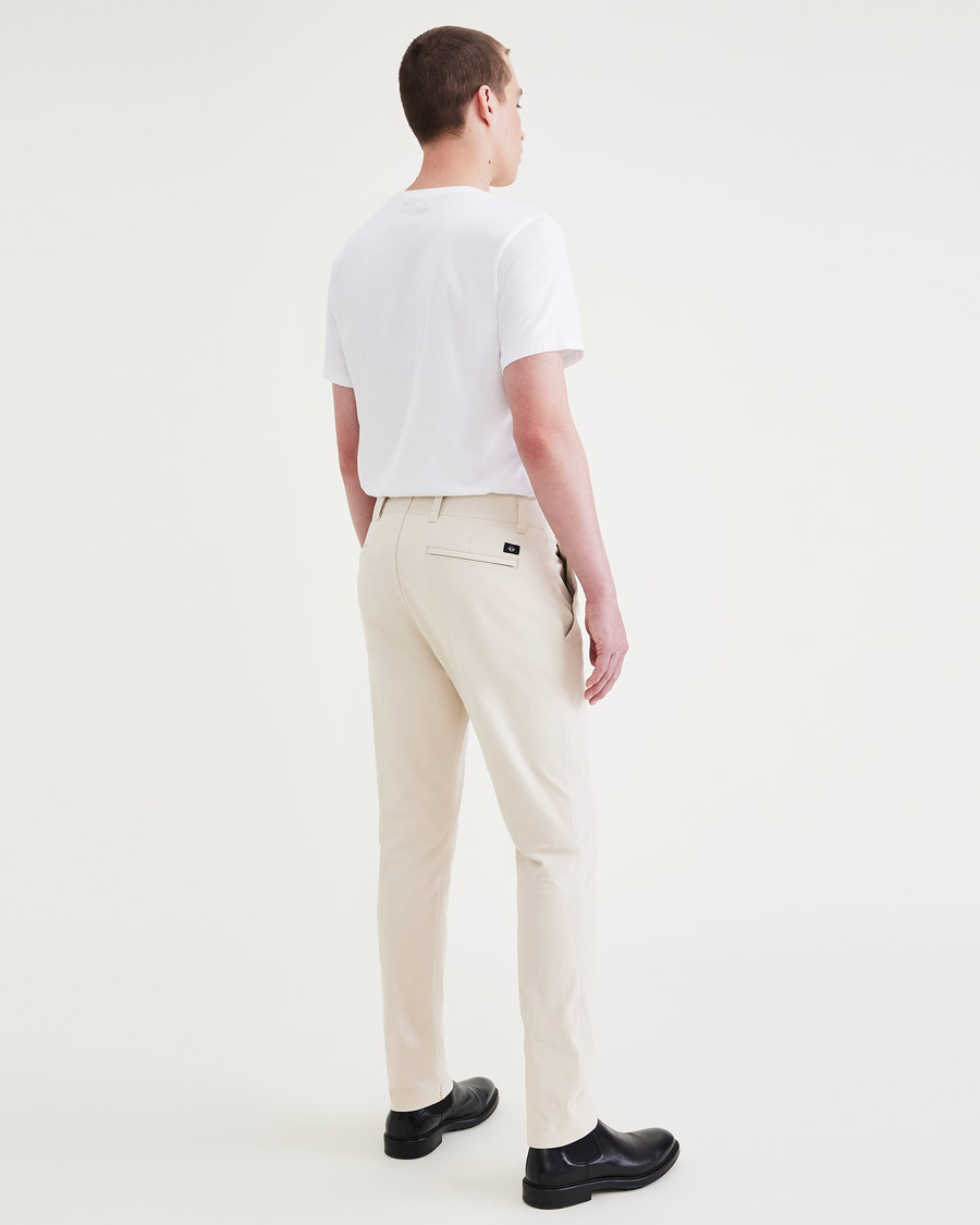 Back view of model wearing Sahara Khaki Alpha Chino Pants, Slim Fit.