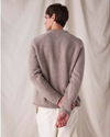 Back view of model wearing Sahara Khaki Dockers® x Transnomadica Mariner Sweater.