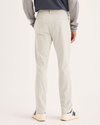 Back view of model wearing Sahara Khaki Go Activeflex Chino, Skinny Fit.