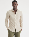 Front view of model wearing Sahara Khaki Men's Slim Fit Icon Button Up Shirt.