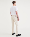 Back view of model wearing Sahara Khaki Men's Slim Fit Smart 360 Flex California Chino Pants.