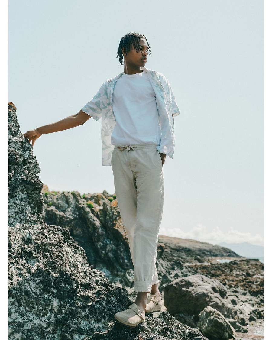 Front view of model wearing Sahara Khaki Men's Straight Tapered Fit California Pull-On Pants.