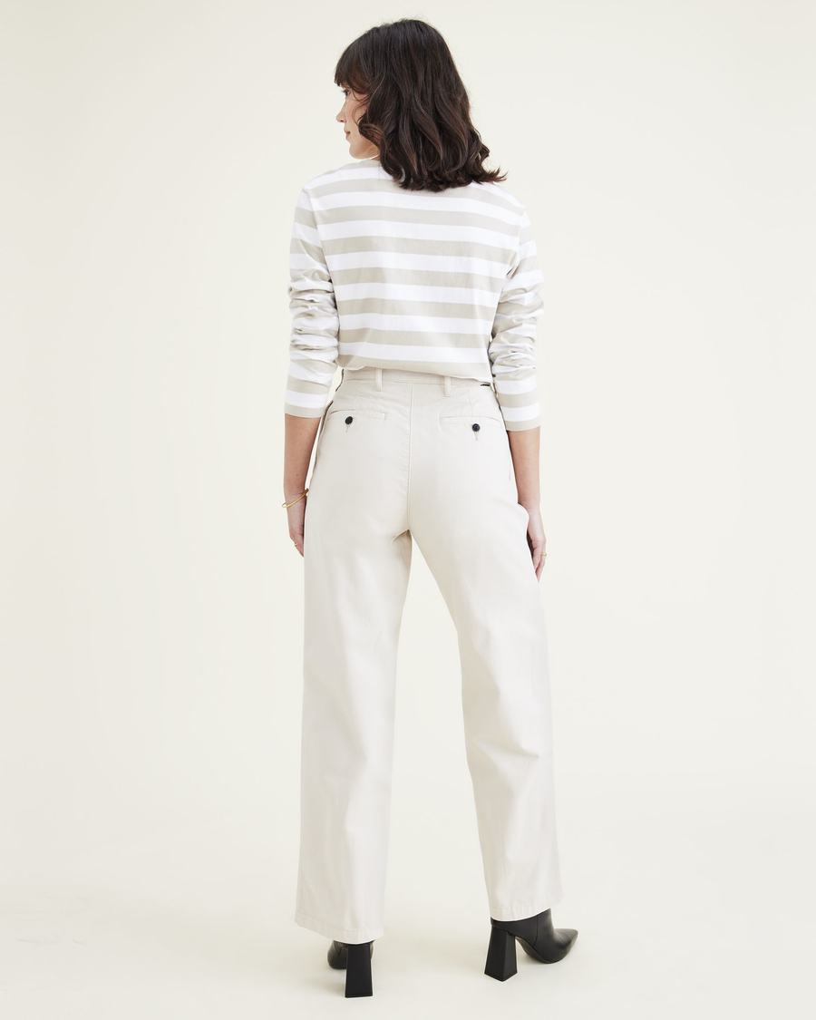 Back view of model wearing Sahara Khaki Women's Straight Fit Original Pleated High Wide Khaki Pants.