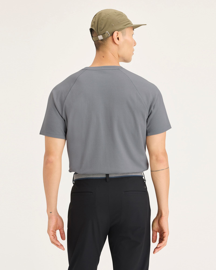 Back view of model wearing Sharkskin Go Tee, Slim Fit.