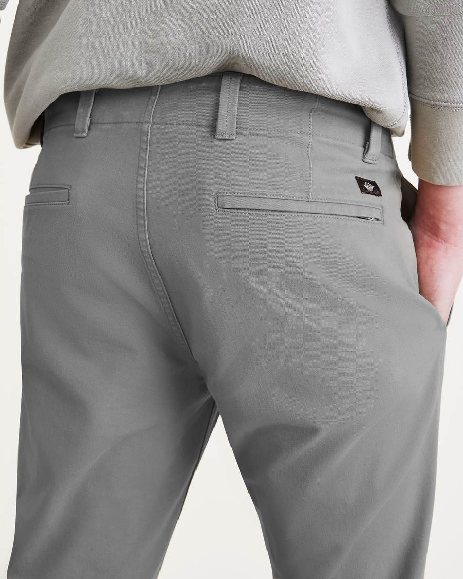 View of model wearing Sharkskin Men's Skinny Fit Smart 360 Flex California Chino Pants.