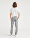 Back view of model wearing Sharkskin Men's Skinny Fit Smart 360 Flex California Chino Pants.