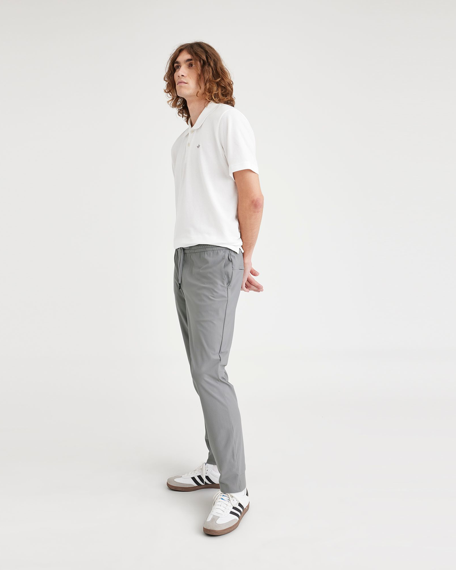 View of model wearing Sharkskin Men's Slim Fit Go Jogger Pants.